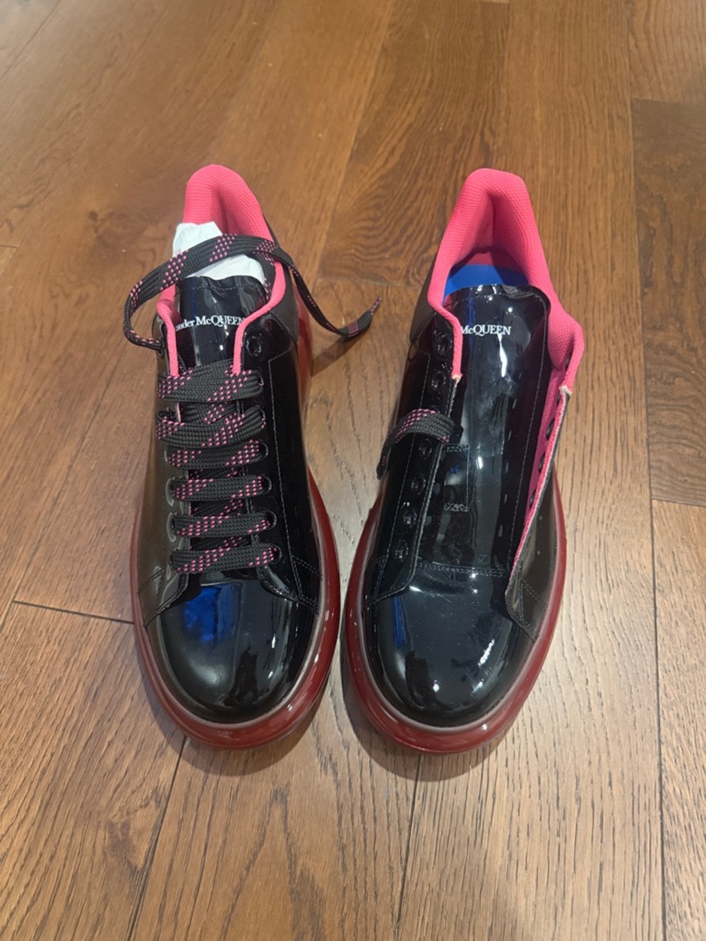Alexander McQueen Glossy Black Sneakers with Pink Accents
